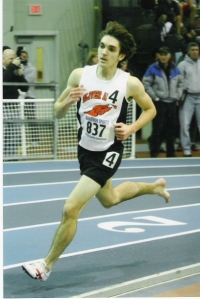 Jake Marcus with no shoe in a track race