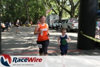 Melissa Larson finishes the 5K with her son
